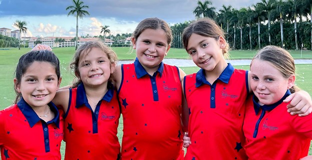 A junior girl's golf team